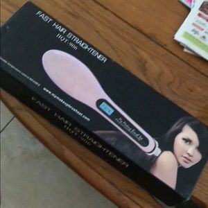 Hair straightening brush.